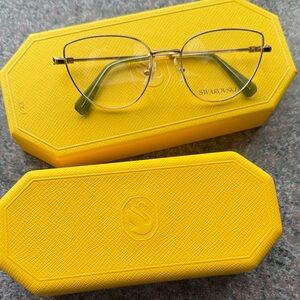 Swarovski sk1007 with Bright Yellow Case